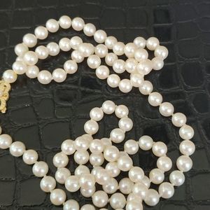 Mikimoto single strand pearl necklace.